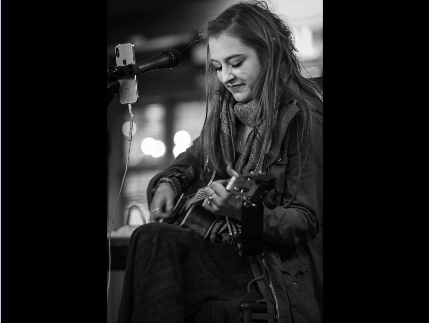 Amanda playing guitar