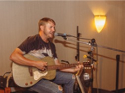 John Playing Guitar